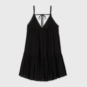 Black sleeveless tiered swing dress